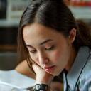 Portrait of Aisha studying with smartwatch